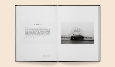 Utterly Lazy and Inattentive &ndash; Martin Parr in Words and Pictures open on a peach-colored surface