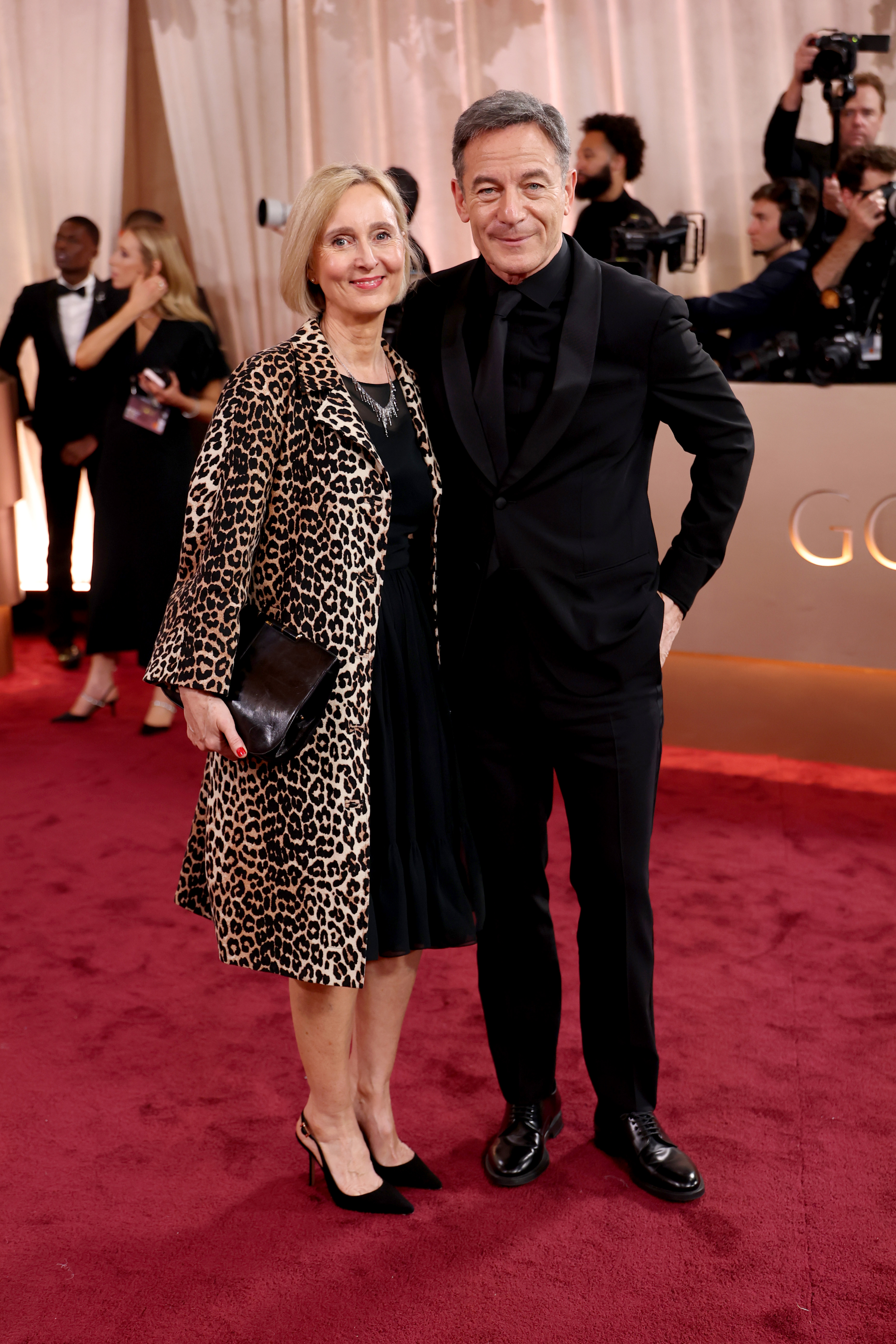 Emma Hewitt and Jason Isaacs on the Golden Globe Awards red carpet.