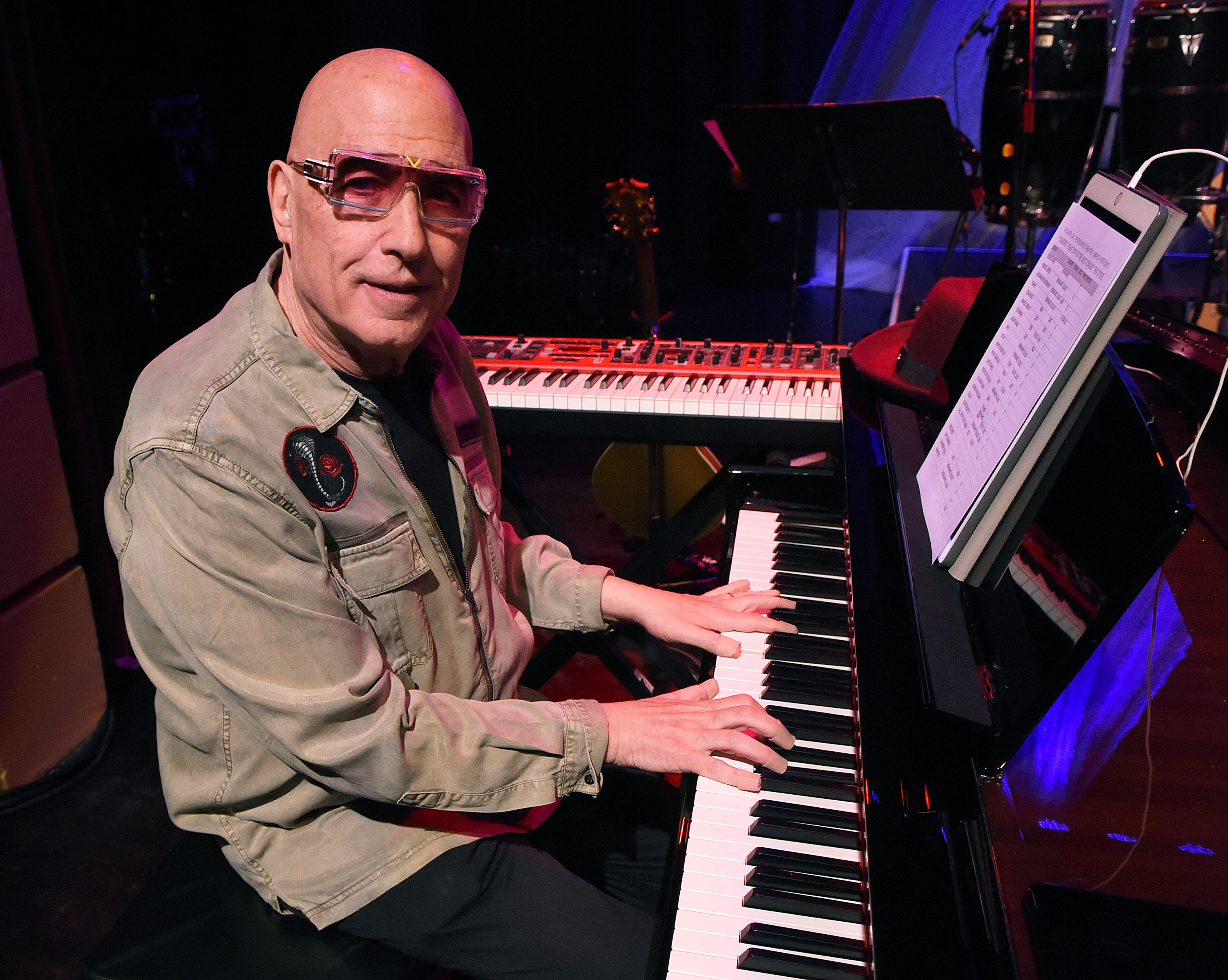 Pianist Mike Garson warms up before his performance.