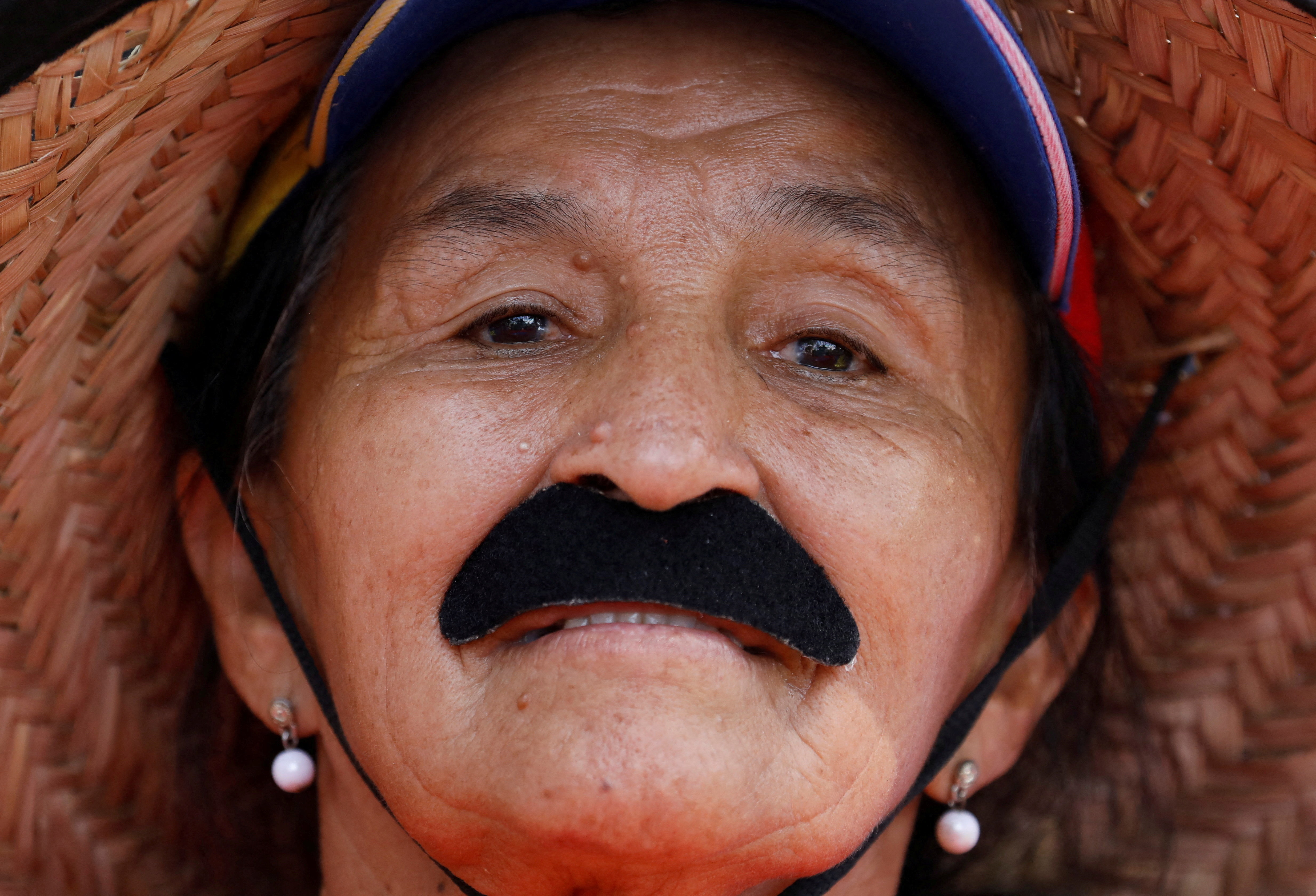 Government supporters participate in a women's march, in Caracas