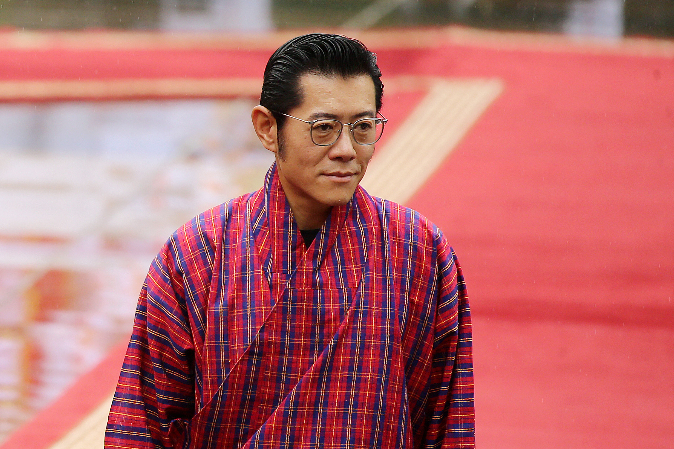 Bhutan's King Jigme Khesar Namgyel Wangchuck reviews a guard of honour.
