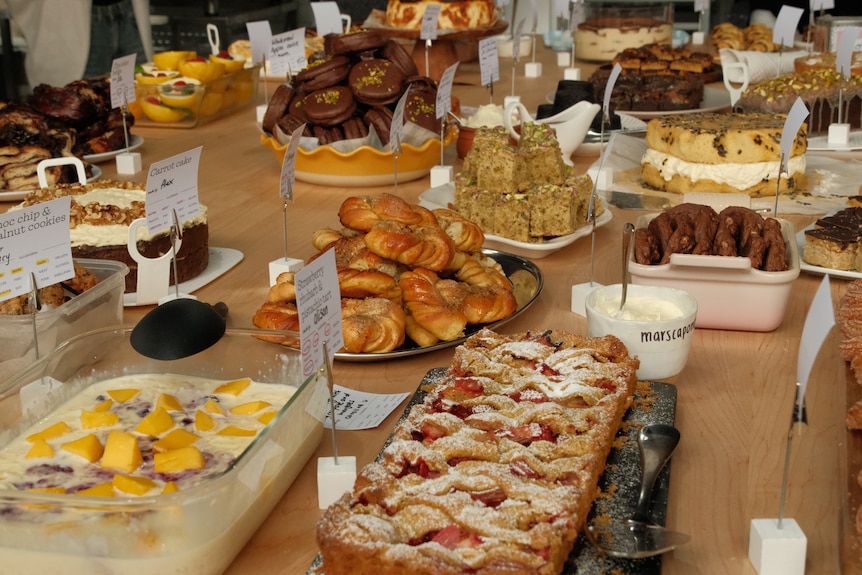 a table covered with beautiful looking food