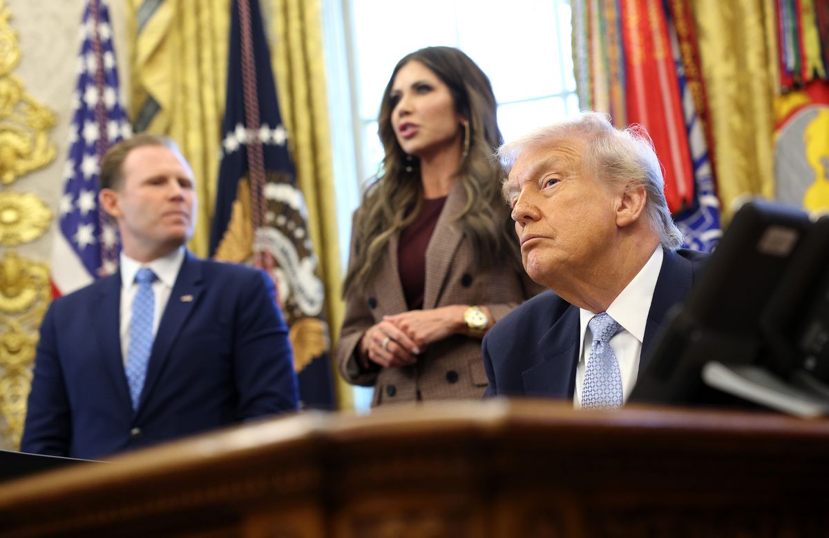 White House officials Kristi Noem and President Trump