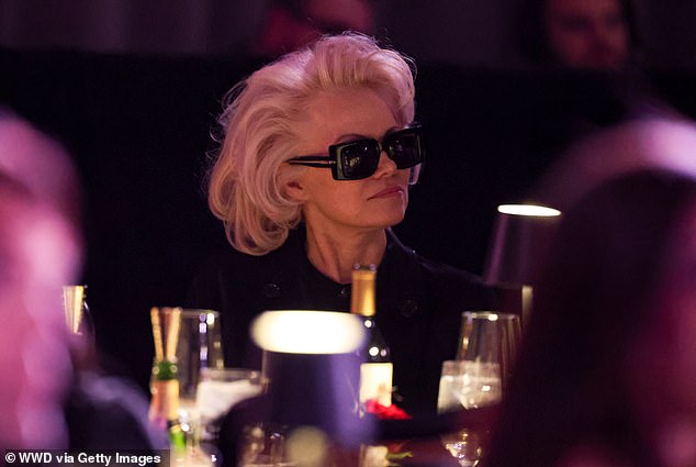 Pamela Anderson looked effortlessly cool as she watched stars take the stage