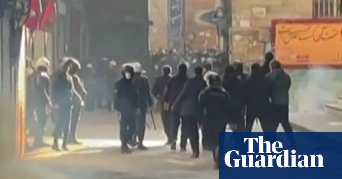Iranian security forces clash with protesters at Tehran’s grand bazaar | Iran