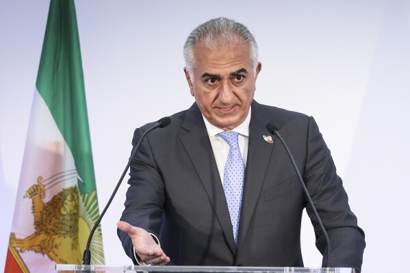 FILE - Reza Pahlavi, the son of Iran's toppled Shah Mohammad Reza Pahlavi, speaks during a news conference, June 23, 2025 in Paris. (AP Photo/Thomas Padilla)