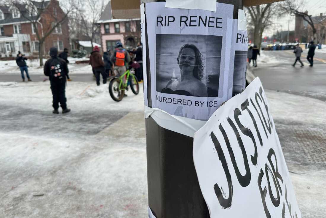 A makeshift memorial honoring the victim of a fatal shooting involving federal law enforcement agents is taped to a post near the site of the previous day's shooting, Thursday, Jan. 8, 2026, in Minneapolis, Minn. (AP Photo/Mike Householder)