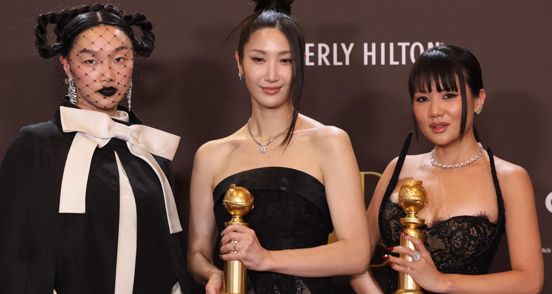 From left, Chris Appelhans, Maggie Kang and Michelle Wong, winners of the award for Best Motion Picture — Animated for
