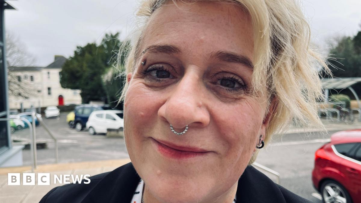 Black and white photos of Emma Barnett and John Simpson against a stylised background of dark orange and light orange. In the top left are two interlinked circles and the BBC logo in front of the words InDepth