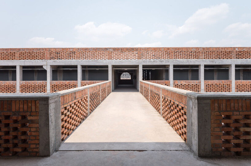 concrete canopies and porous brick walls form central market redevelopment in congo