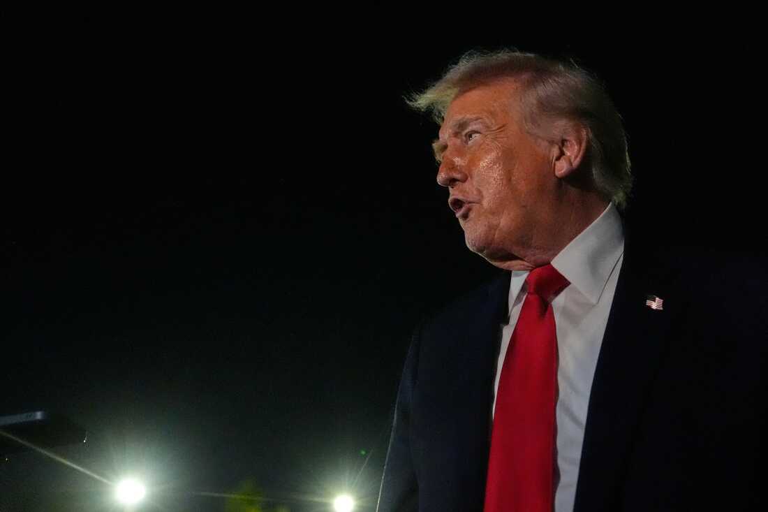 President Donald Trump speaks to reporters before boarding Air Force One at Palm Beach International Airport, Monday, Jan. 19, 2026, in West Palm Beach, Fla.