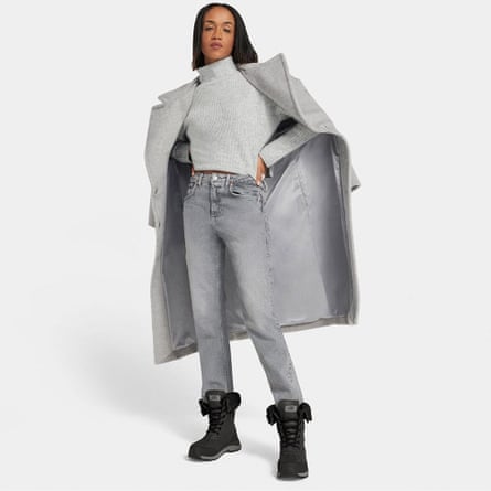 A model wearing Ugg Adirondack III Boots