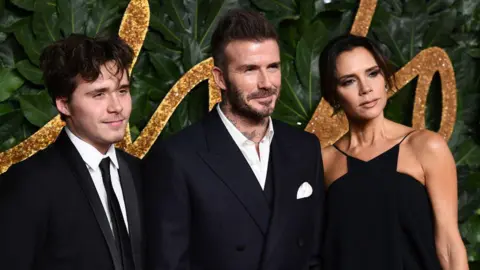 Getty Images Brooklyn, Victoria and David Beckham
