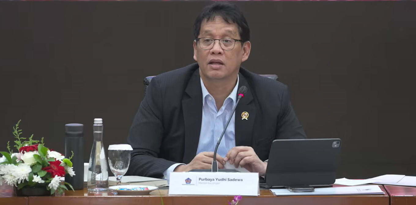 Finance Minister Purbaya Yudhi Sadewa speaks on Dec. 18, 2025, during the monthly state budget press conference.