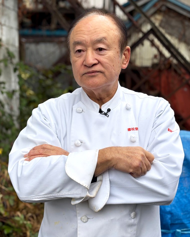 Keiji Minatoya in the yard behind his bakery where he was attacked by a bear.