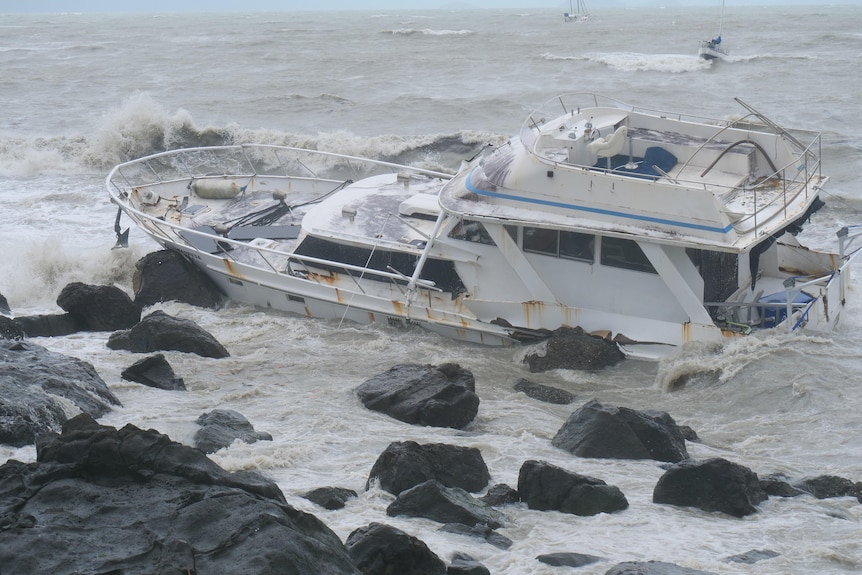 A boat overcome by waves.