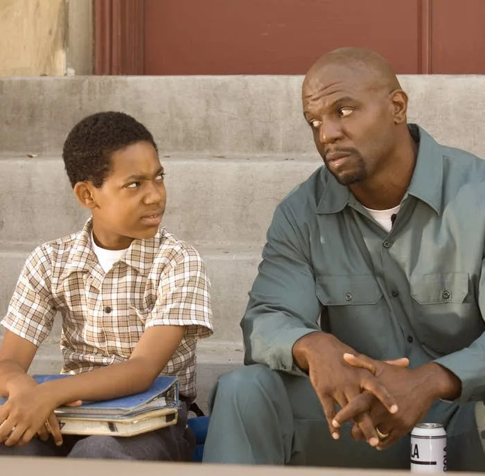 Tyler James Williams and Terry Crews in a TV scene