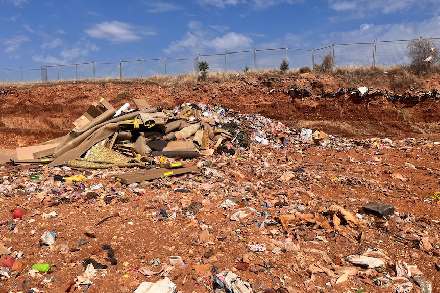 Pile of rubbish in landfill.