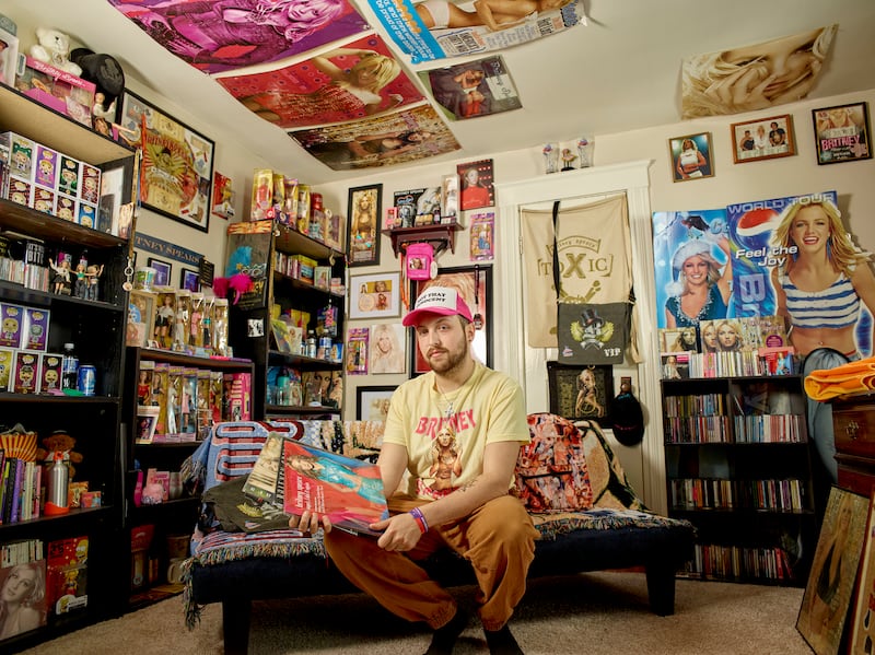 Zachary Gordon-Abraham surrounded by Britney Spears memorabilia at home in northeastern Pennsylvania. Photograph: Noah Kalina/The New York Times
                      