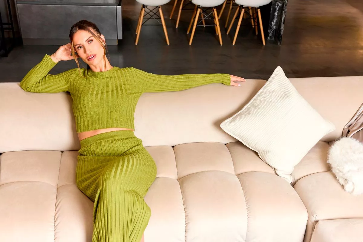 ferne mccann in green on beige sofa