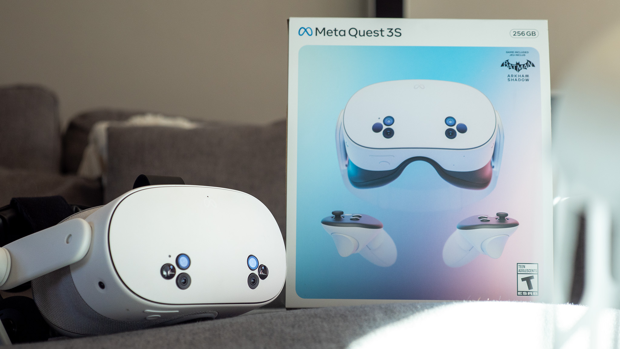 A Meta Quest 3S with the Meta Breathable Facial Interface attached, next to the Meta Quest 3S 256GB box