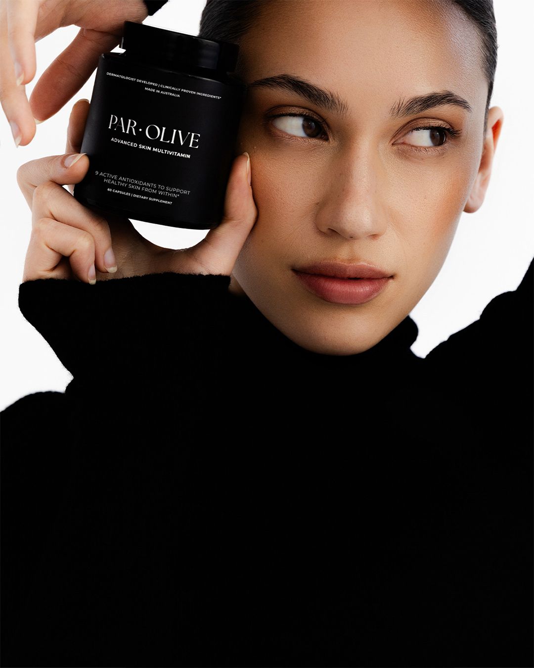 Image may contain Photography Face Head Person Portrait Adult Bottle Cosmetics and Perfume