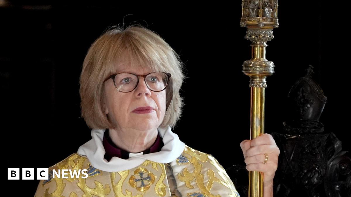 Dame Sarah Mullally wears gold and blue decorated robes as she conducts the Christmas Day Eucharist service at St Paul's Cathedral, London