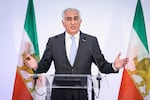 Reza Pahlavi, the son of Iran's toppled Shah Mohammad Reza Pahlavi, speaks during a press conference, Monday, June 23, 2025 in Paris.