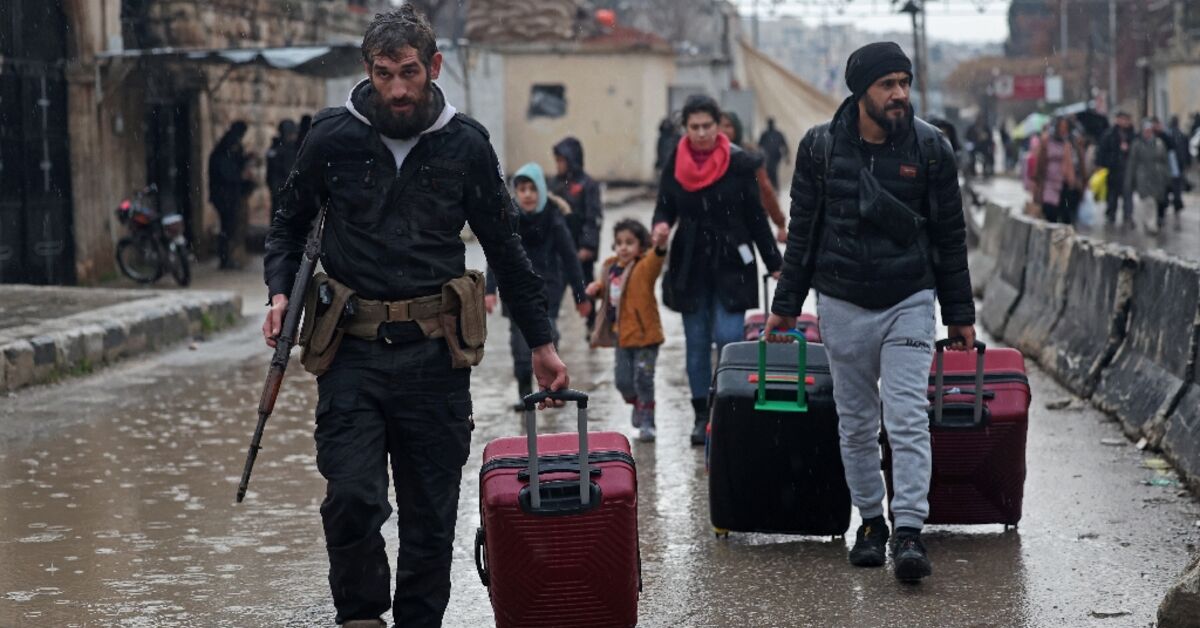 Syrian army says swept Aleppo district after clashes with Kurdish fighters