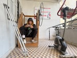 A Palestinian man wounded in the war sits near a stationary bike used for physiotherapy at MSF’s clinic in Gaza City on Dec. 31, 2025.