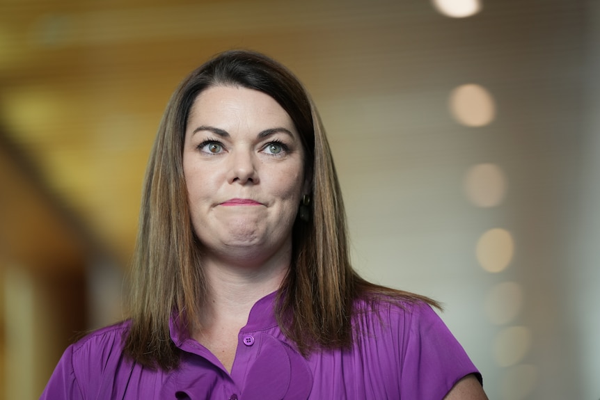 A woman looking serious.