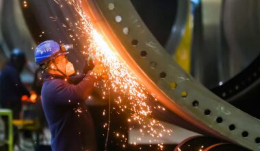 A worker operates in the production workshop of China Construction Equipment & Engineering Co in Nanjing of East China