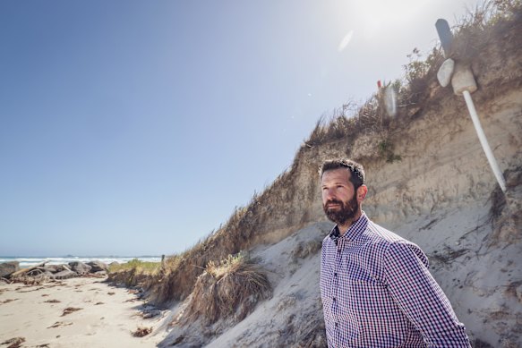 Deakin University’s Blake Allan at Port Fairy, where erosion has hit beach areas hard. 
