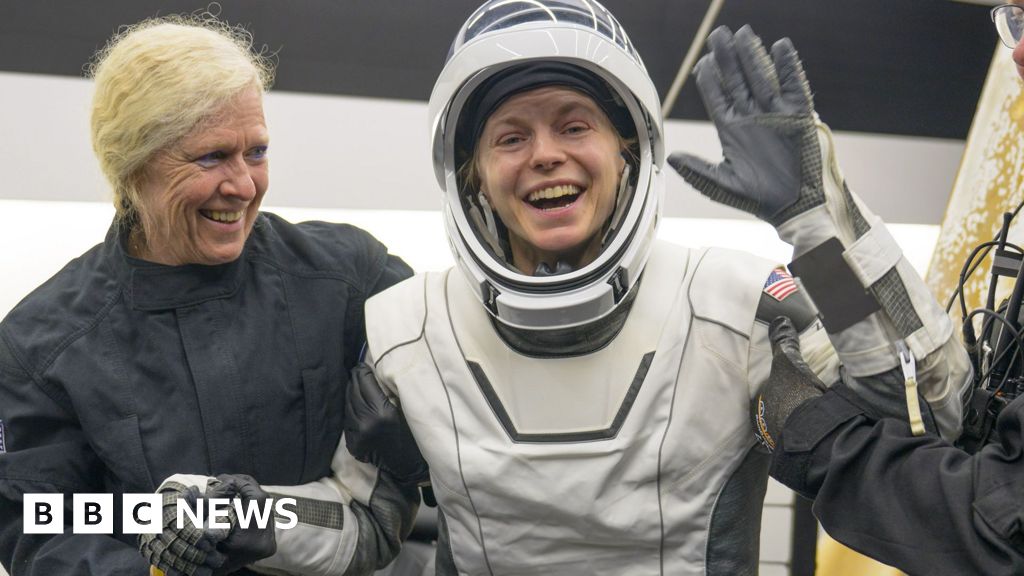 Astronauts return to Earth after medical evacuation
