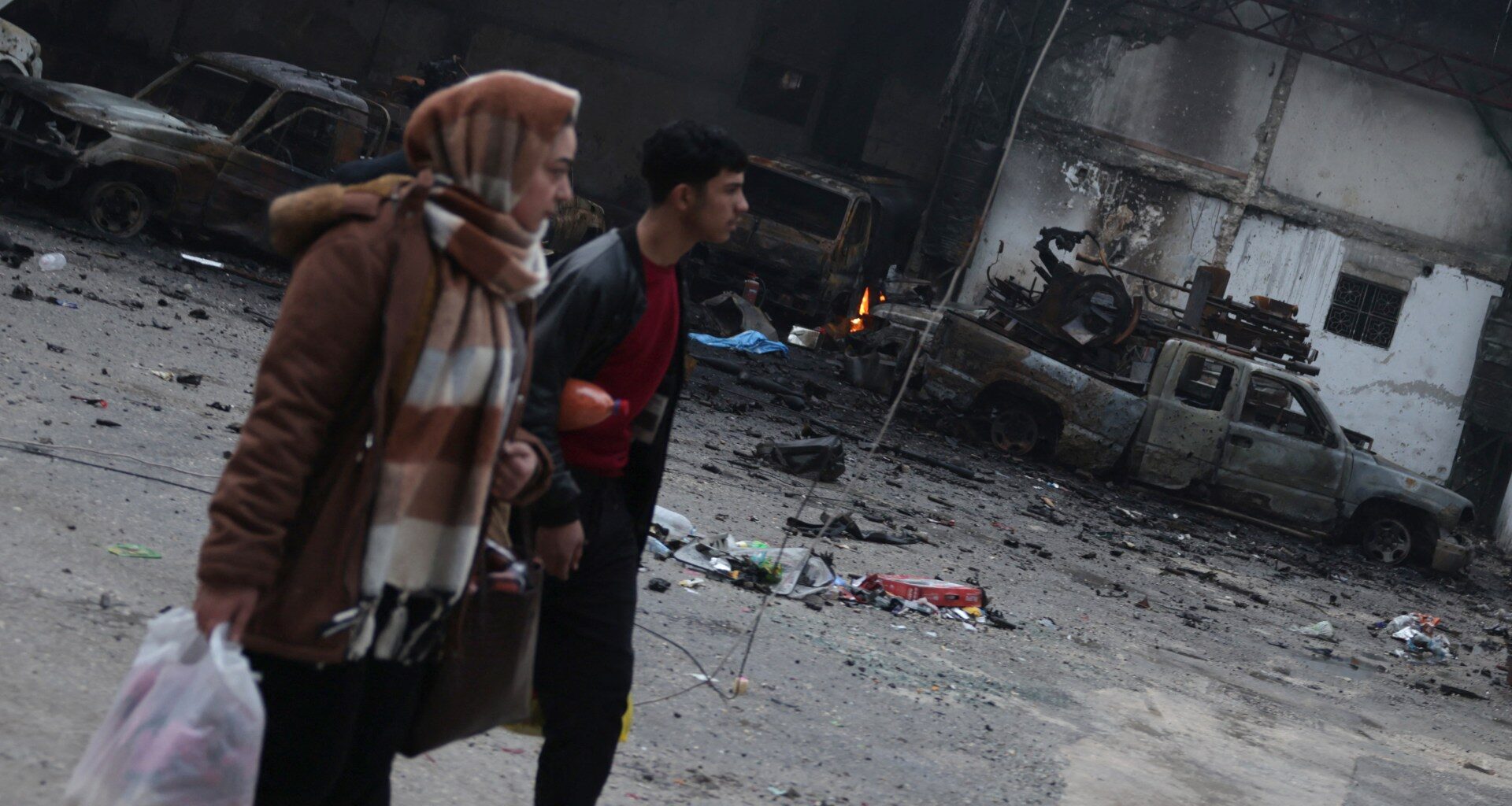 Syrians in Kurdish areas of Aleppo pick up pieces after clashes | Syria's War News