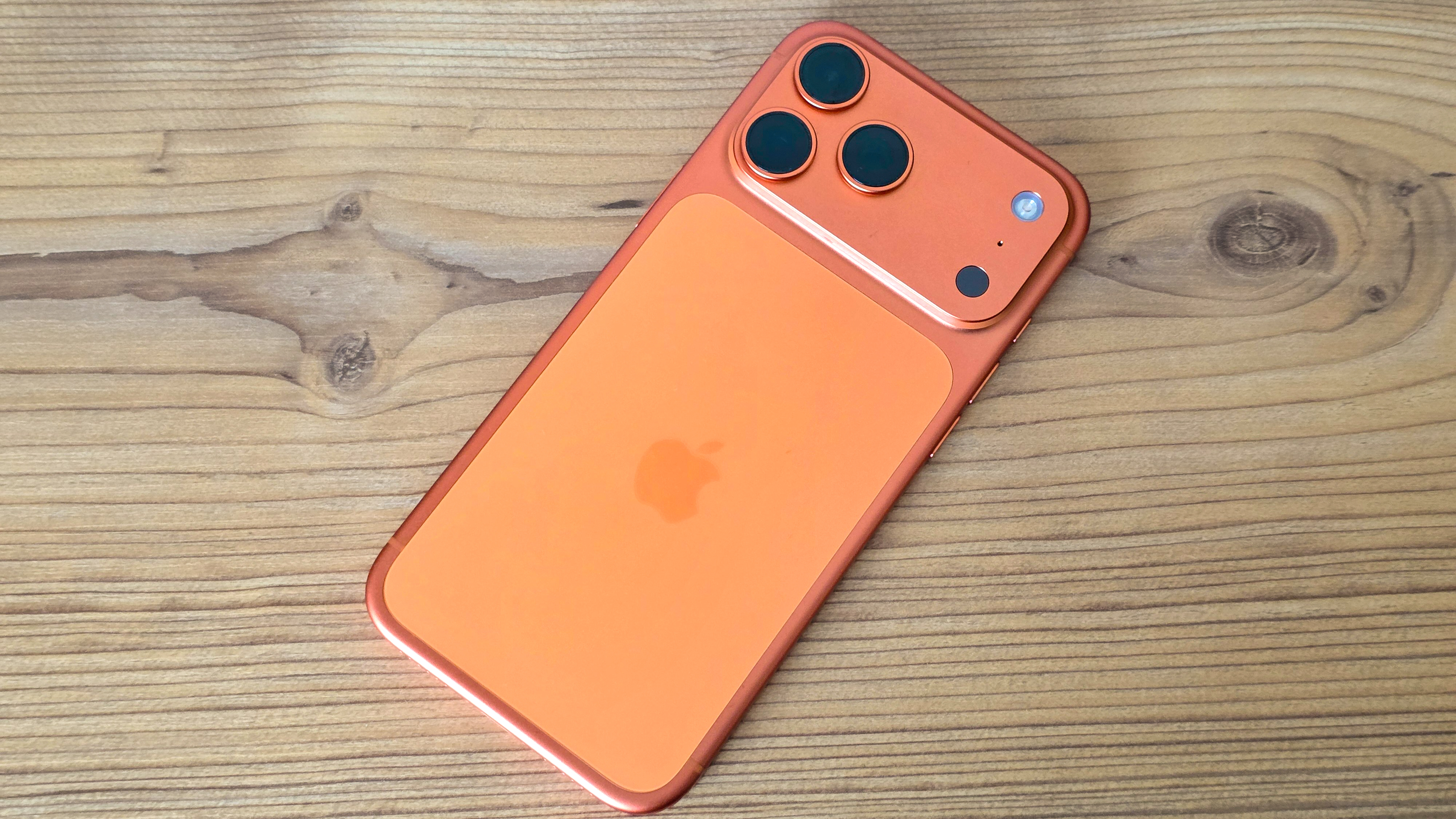 iPhone 17 Pro Max back with wood background