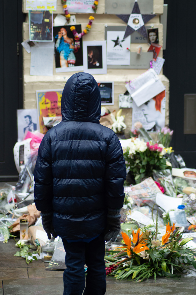 Young boy at the Bowie memorial, Heddon St., London - 17th January 2016