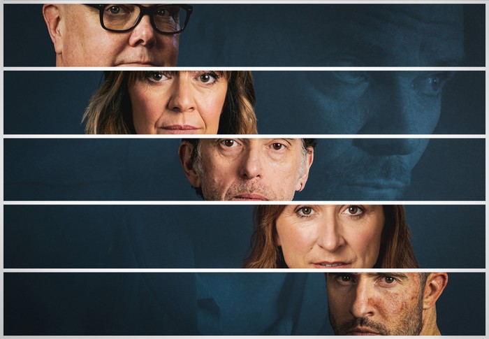 A stylised image of five horizontal segments showing Emmerdale's Paddy Kirk, Rhona Goskirk, Marlon Dingle, Laurel Thomas, and Ross Barton, with the figure of Ray Walters forming the background to all combined.