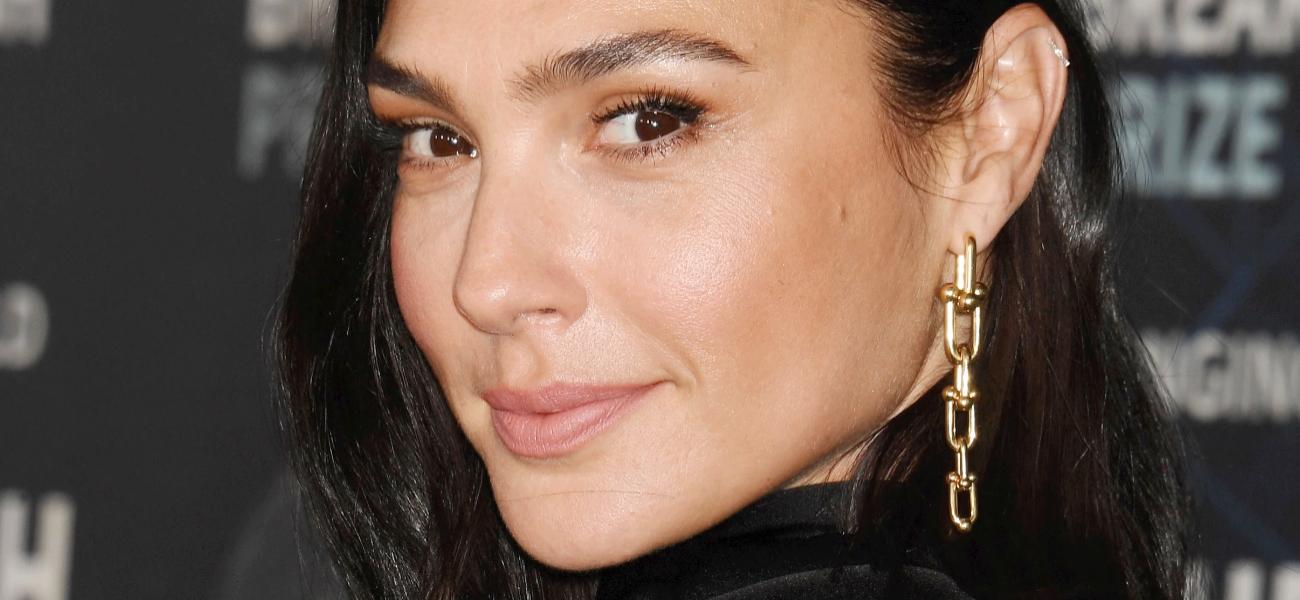 Gal Gadot Stuns Smiling In Skimpy Swimsuit On Her Gym Bike