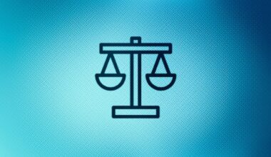 Close up of justice scales icon on screen