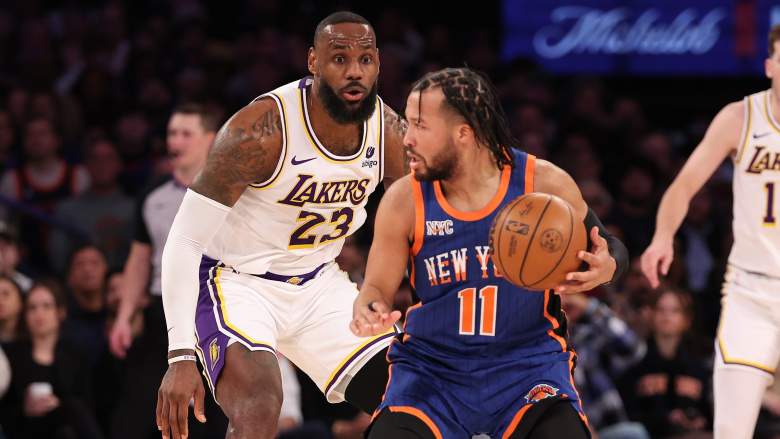 Los Angeles Lakers forward LeBron James defends New York Knicks guard Jalen Brunson