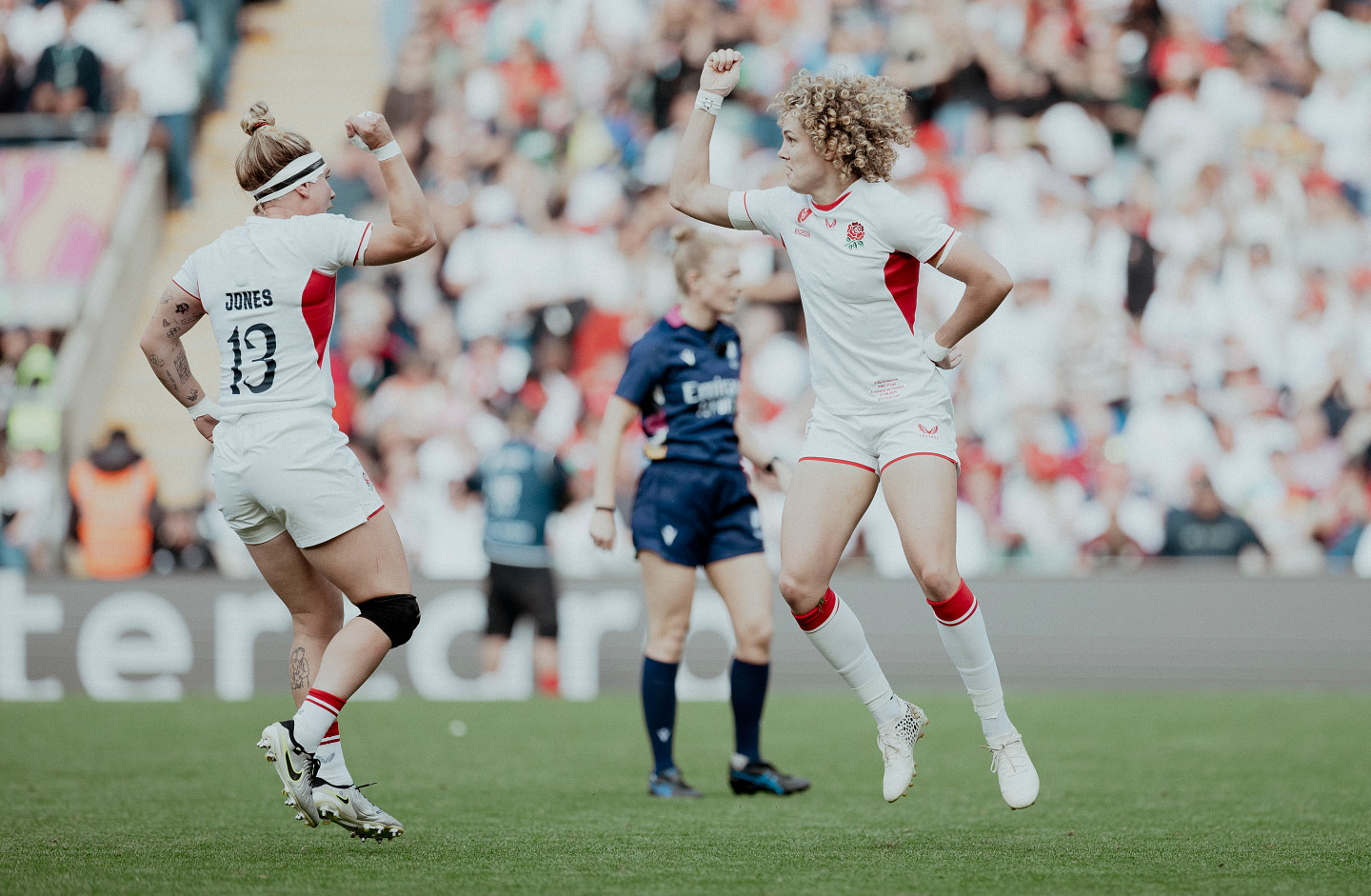 Ellie Kildunne and Meg Jones do the cowboy/rodeo celebration after Kildunne scores in the rugby world cup final against Canada.