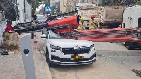 Woman killed after strong winds topple crane truck in Jerusalem