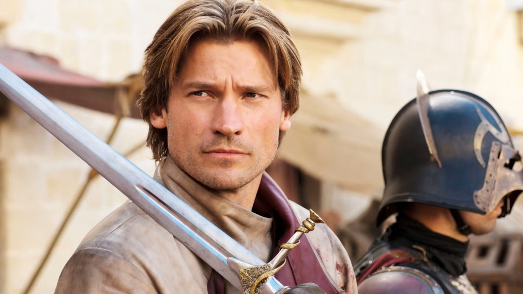 Nikolaj Coster-Waldau as Jaime Lannister holding a sword in Game of Thrones