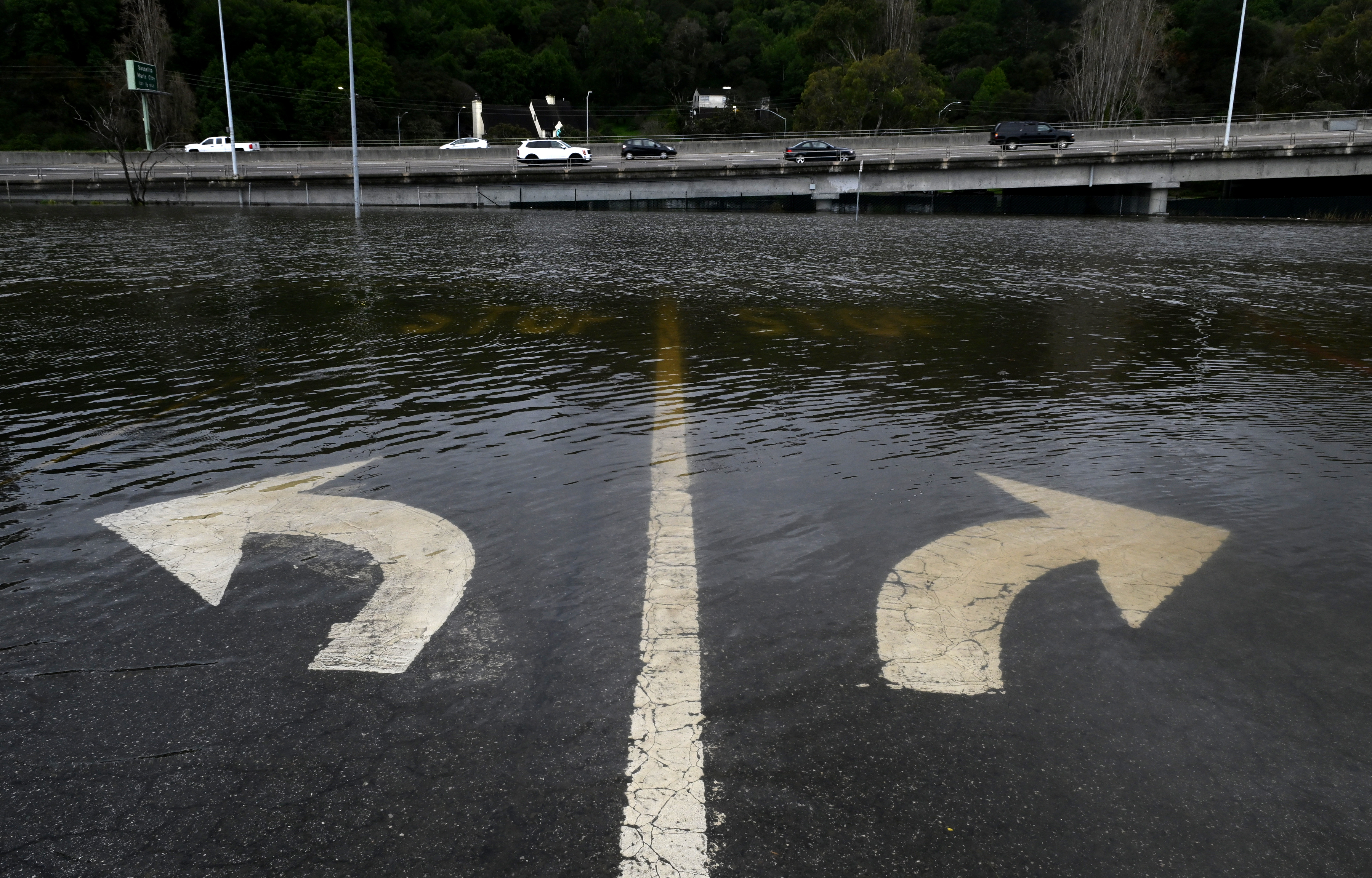 Flooding covers the intersection of Pohono Street and Shoreline Highway...