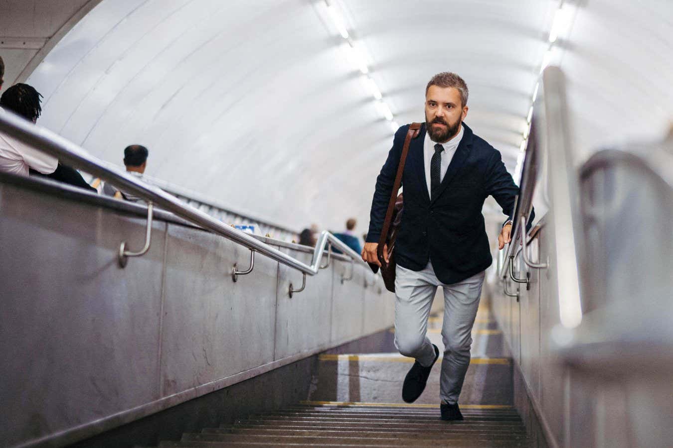 Man walking out of subway station