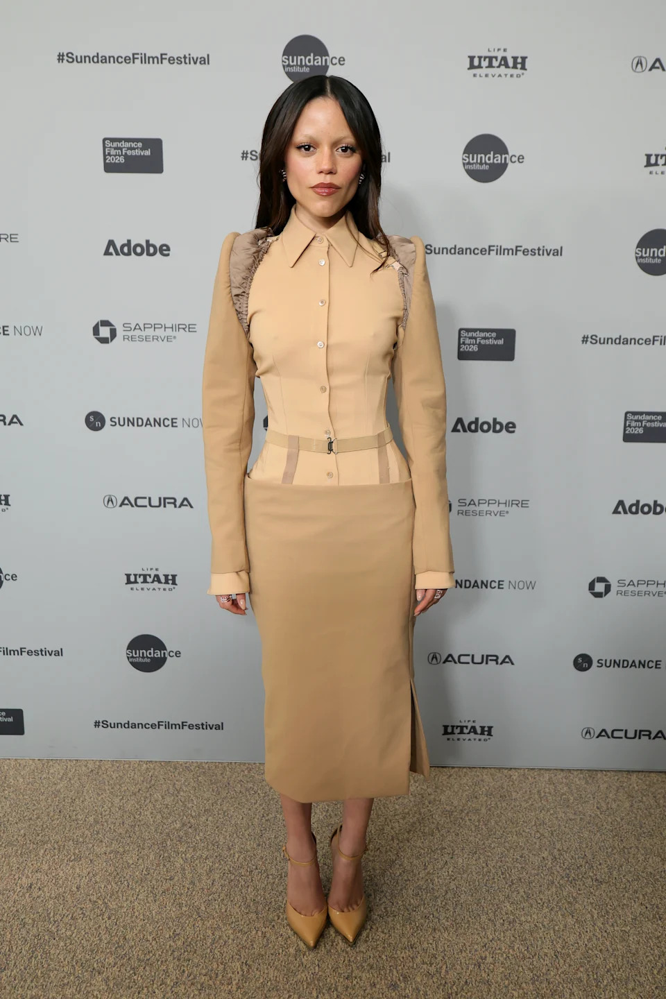 Jenna Ortega in a Mugler spring 2026 ensemble attends "The Gallerist" Premiere during the 2026 Sundance Film Festival at Eccles Center Theater on Saturday. Jenna Ortega style, neutrals on the red carpet