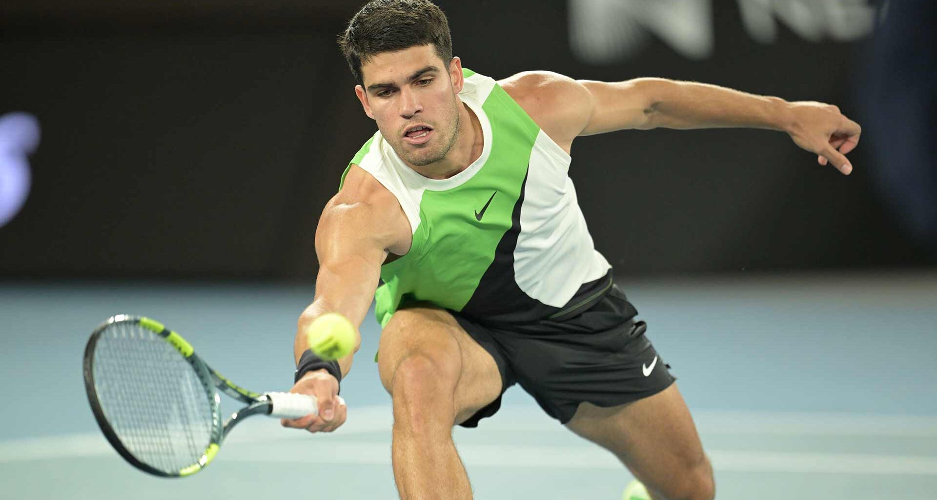 Carlos Alcaraz begins his quest to complete the career Grand Slam at the Australian Open with a straight-sets win Sunday night.