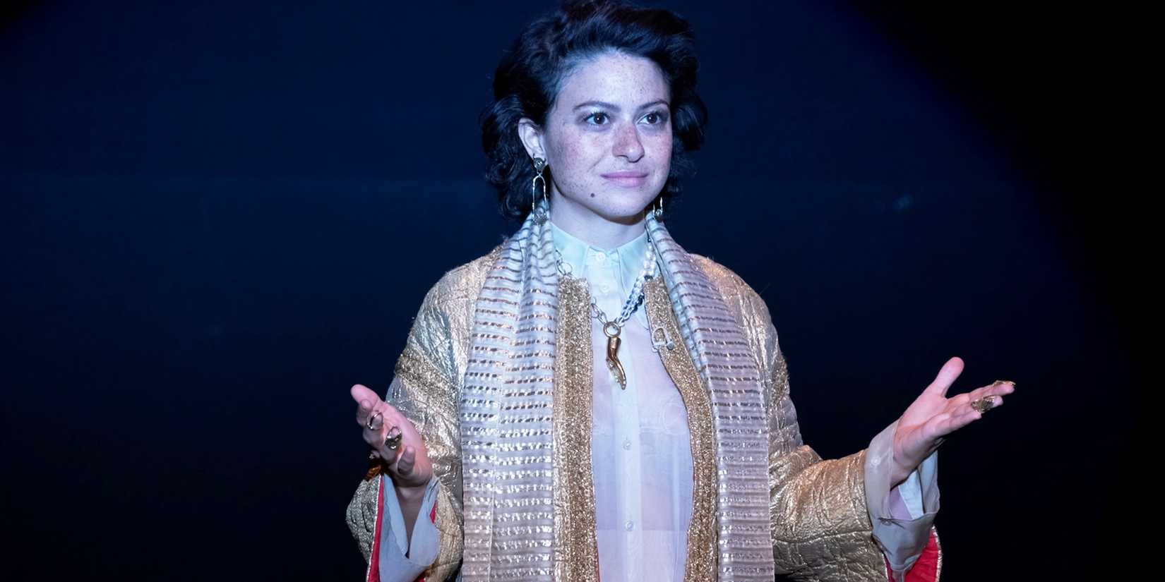 Alia Shawkat's Dory smiling as a cult leader in Search Party Season 5