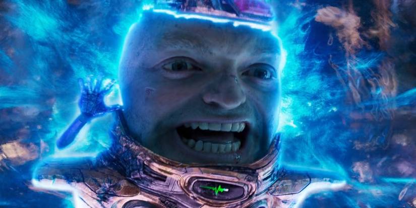 M.O.D.O.K., played by Corey Stoll, bursts through an energy shield in 'Ant-Man and the Wasp: Quantumania'​​​​​​​.
